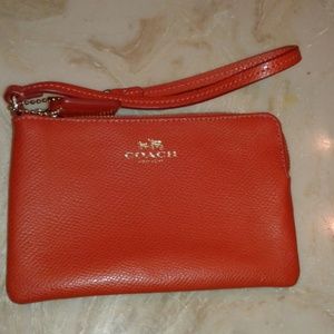 Coach orange wristlet